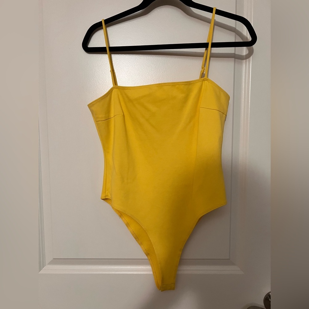 Shinestar yellow bodysuit  size large (never worn)